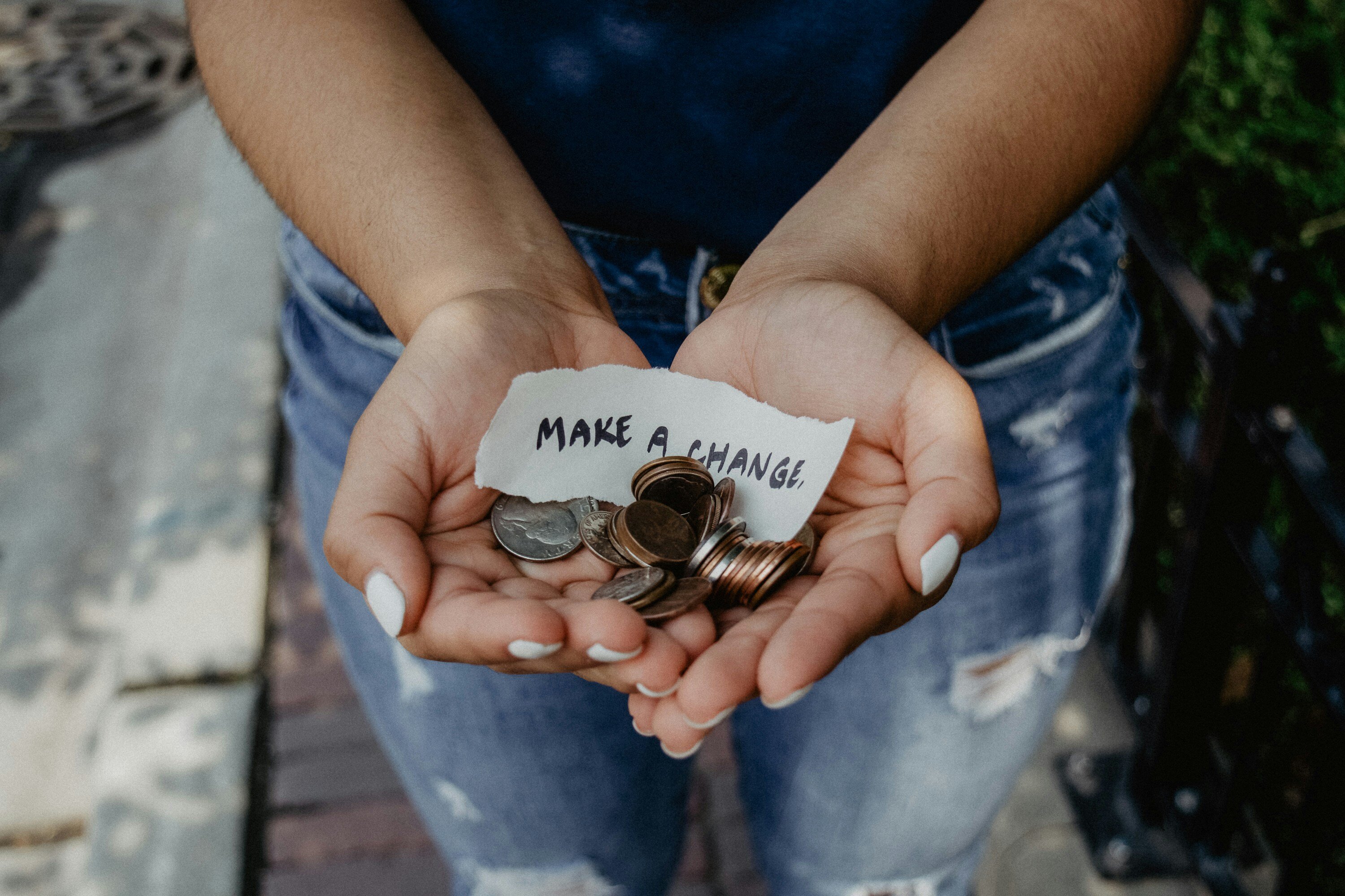 Girl holding change